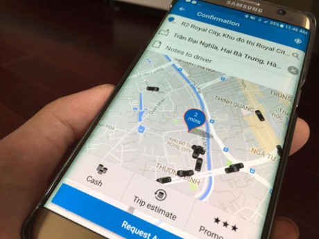 Canh tranh voi Uber, Grab: Taxi ke bat chuoc, nguoi doa kien - Anh 1
