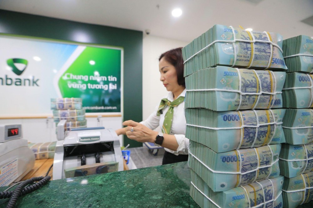 Hệ thống tài chính Việt Nam phải đối mặt với nguy cơ rủi ro tài chính do tác động ngoại nhập. Ảnh: Quốc Tuấn