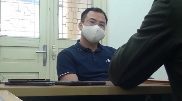 Facebooker Đặng Như Quỳnh tại cơ quan công an. Ảnh: VTV