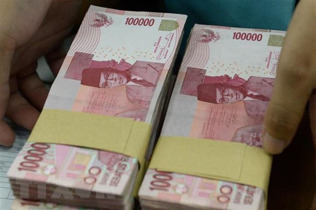 Đồng rupiah của Indonesia. (Ảnh: AFP/TTXVN)